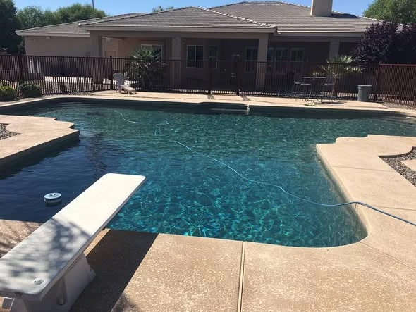 Residential swimming pool photographed from the deck